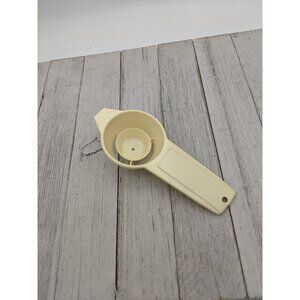 Cream Colored Hand Held Egg Separator 5 3/4"